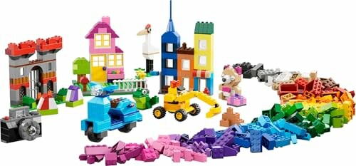 Colorful Lego buildings, vehicles, and bricks arranged in a rainbow pattern.