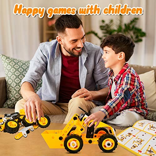 Father and son playing with toy construction vehicles.