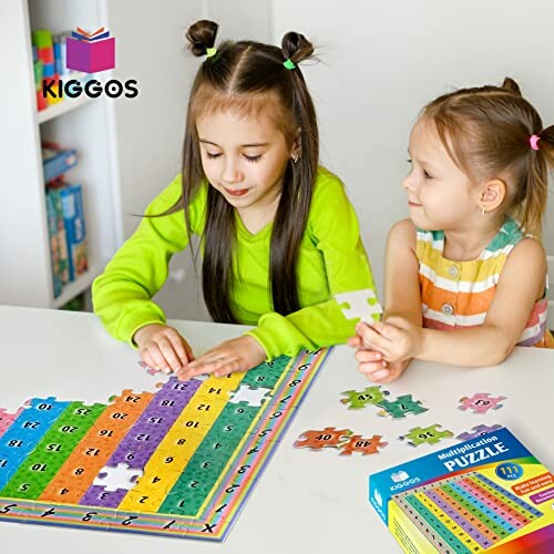 Two children assembling a colorful multiplication puzzle.