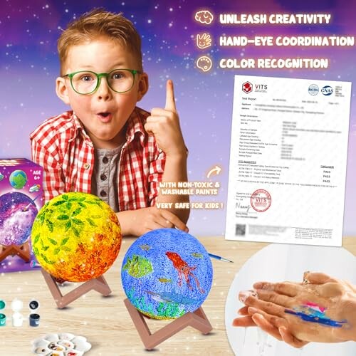 Child with glasses excitedly showing painted globes, promoting creativity and coordination.